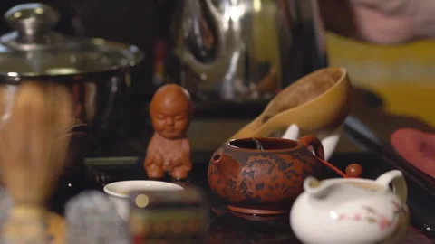 Tea ceremony. Master's hand closes the lid Stock Footage 89684160