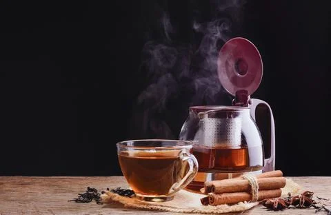 Tea ceremony process Tea ceremony A freshly brewed cup of black tea is placed Stock Photos