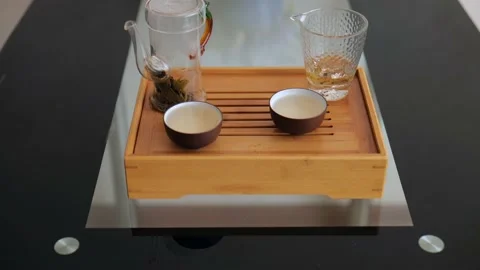 Tea Ceremony. Set for brewing Chinese tea on a tea board. Elite Chinese white Stock Footage 220342257