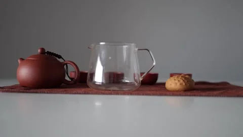 Tea ceremony without tea on the table there are these bowls, a cup of justice an Stock Footage 296998342