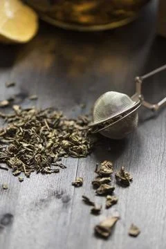 Tea composition with cinnamon sticks, lemons Stock Photos