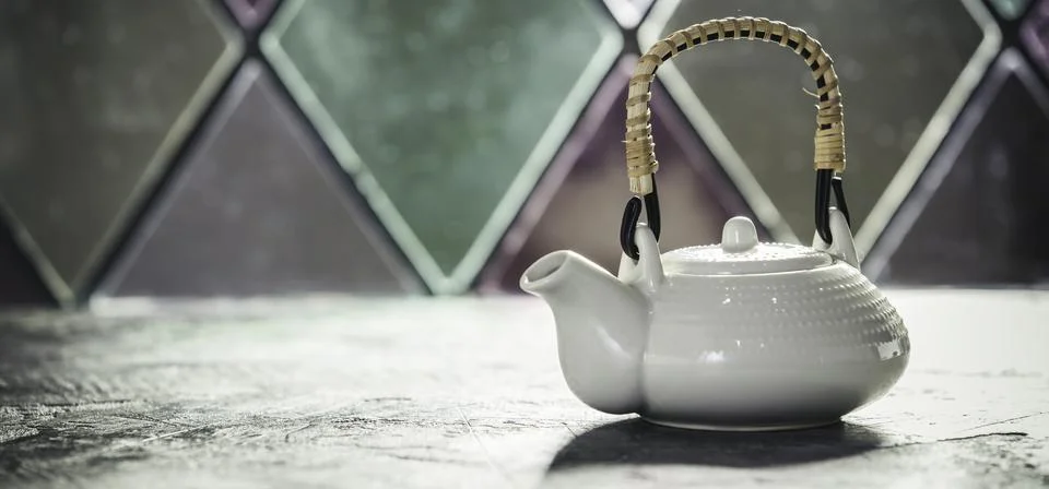 Tea composition near the old window, space for text Stock Photos