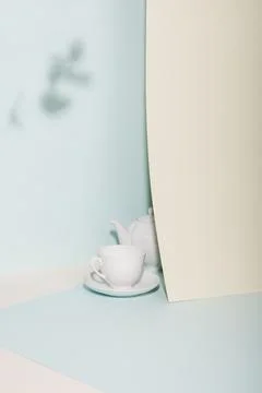 Tea cup and teapot on the table. Stock Photos