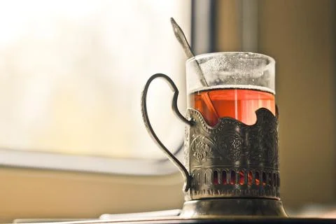 Tea in a Cup holder on the train Stock Photos