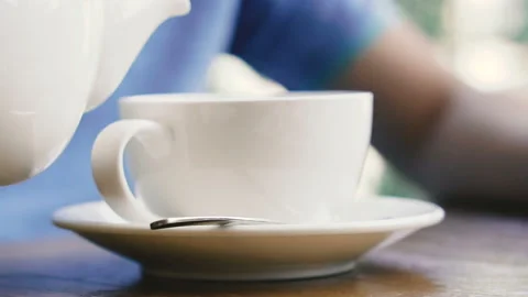 Tea. A cup of tea with a kettle Video stock 111274632