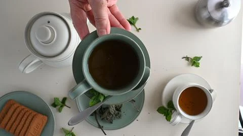 Tea Cups and Can Serving with Green Tea Stock Photos