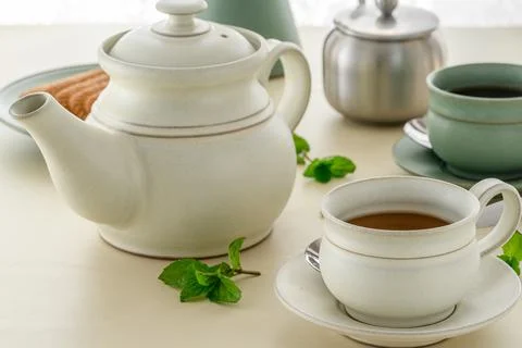 Tea Cups and Can Serving with Green Tea Stock Photos