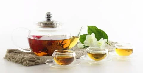 Tea cups and tea pot Stock Photos