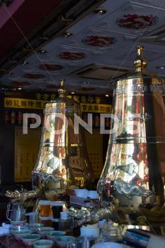 Tea from draught preserved in traditional chinese urn. Stock Photos