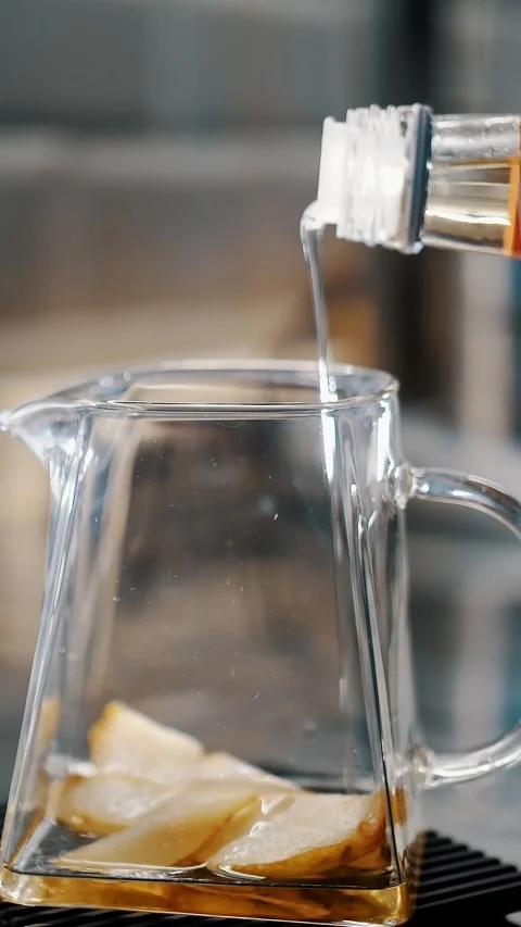 Tea drink. making tea. preparation of drinks. close-up. tea master pours sweet Stock Footage 323512842