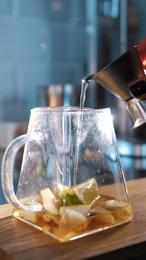 Tea drink. making tea. preparation of drinks. close-up. tea master pours sweet Stock Footage 323513177