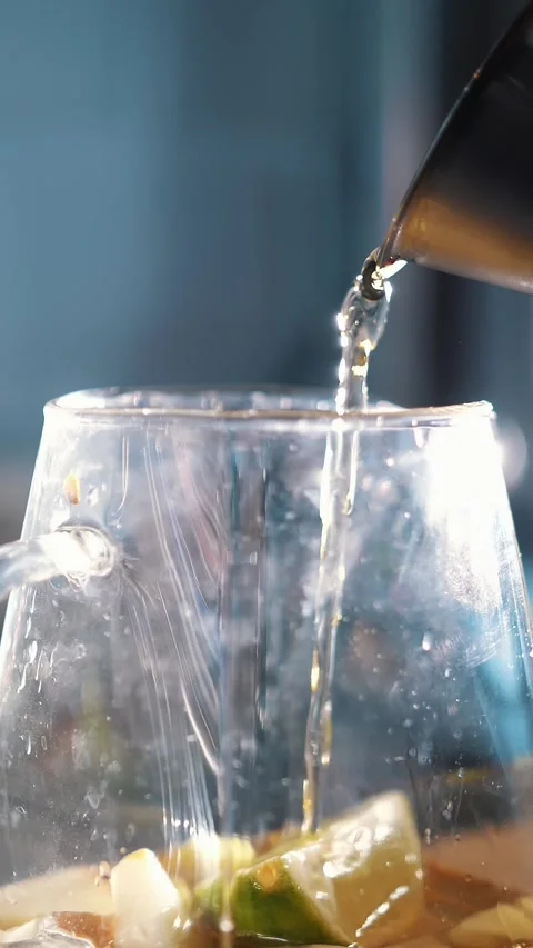 Tea drink. making tea. preparation of drinks. close-up. tea master pours sweet Stock Footage 323513193