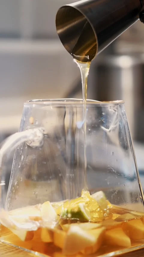 Tea drink. making tea. preparation of drinks. close-up. tea master pours sweet Stock Footage 323513450