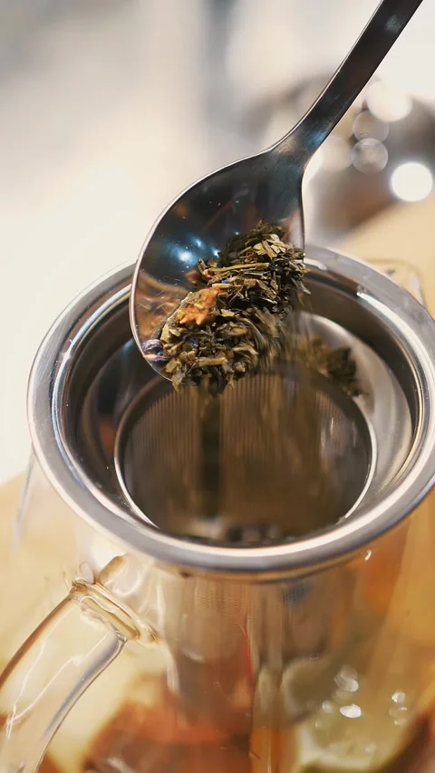 Tea drink. preparation of tea. close-up. top view. a spoonful of dry, flower, Stock-Footage 323436671