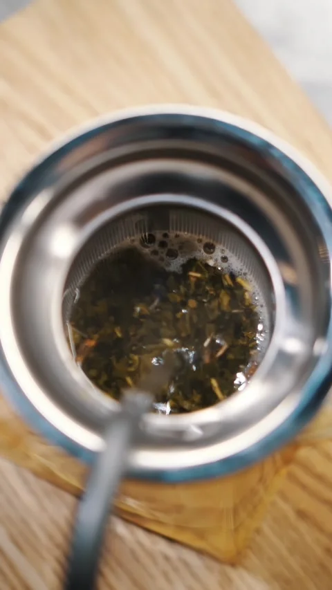 Tea drink. preparation of tea. top view. close-up. boiling water is poured into Stock Footage 323513493