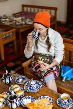 Tea drinking in the Asian style In Buhara Stock Photos