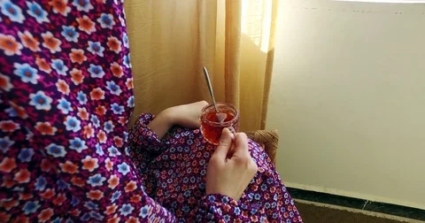 Tea drinking by the window. Stock Footage 76688878