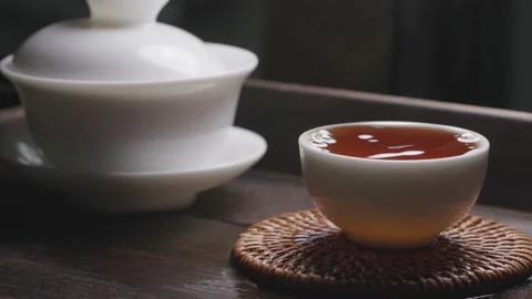 Tea dripping into a cup Stock Footage 234510427