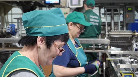Tea factory workers are engaged in the packaging of tea Stock Footage 127470378