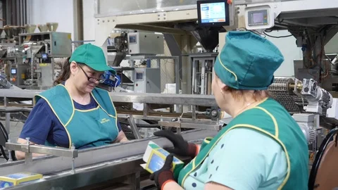 Tea factory workers are engaged in the packaging of tea Video stock 127470410