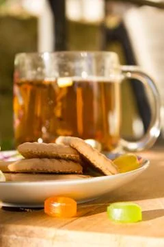 Tea with flower and biscuits boho style Stock Photos