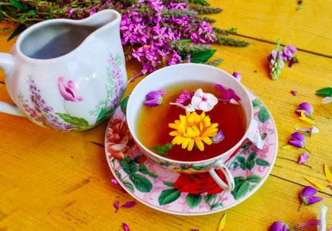 Tea with flowers Stock Photos