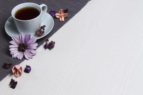 Tea with flowers on the table. A quick snack. In a good mood. Fl Stock Photos