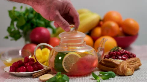 Tea fruit pastries cakes with tea and cherry Stock Footage 323511238