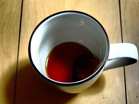Tea on the glass 库存照片