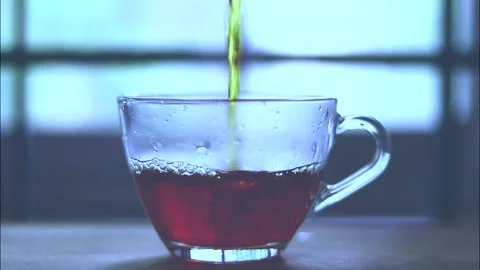 Tea into glass tea cup Stock Footage 156079753
