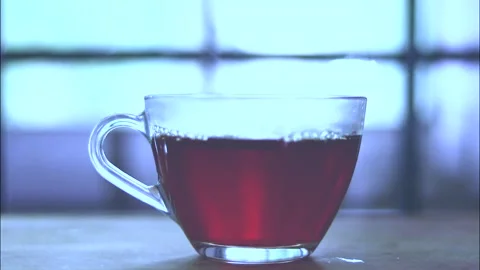 Tea into glass tea cup Stock Footage 156079780