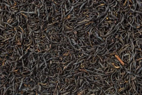 Tea herbs texture. Black tea background. Organic dried black tea leaves. Stock Photos
