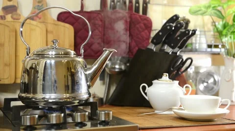 Tea kettle boiling on the fire Stock Footage 43901774