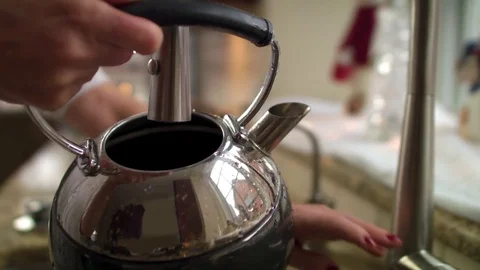 Tea Kettle filled at sink Stock Footage 83667628