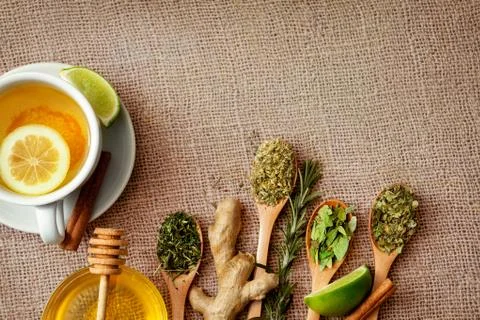 Tea leafs and ginger tea with honey, lime and ginger Stock Photos