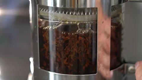 Tea leafs in a tea pot 库存影片 302603317