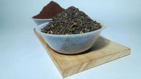 Tea leaves and coffee grounds Stock Photos