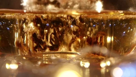 Tea leaves are brewed in a transparent glass teapot. Closeups Stock Footage 73635164