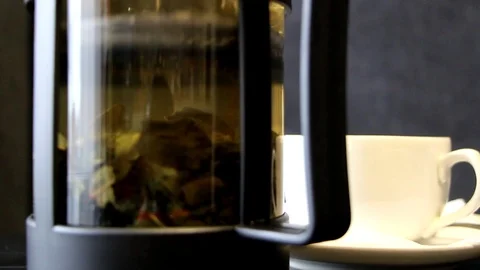 The tea leaves are disclosed in boiling water Stock Footage 96572092