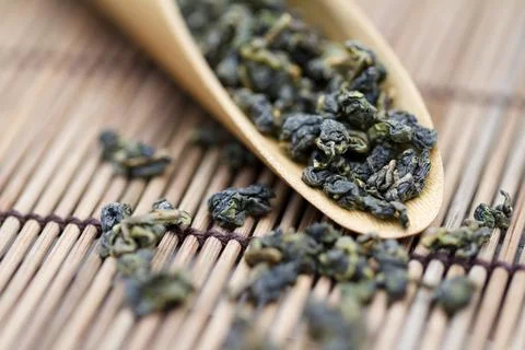 Tea leaves in teaspoon,close-up Stock Photos