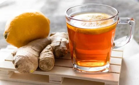 Tea with lemon and ginger Stock Photos