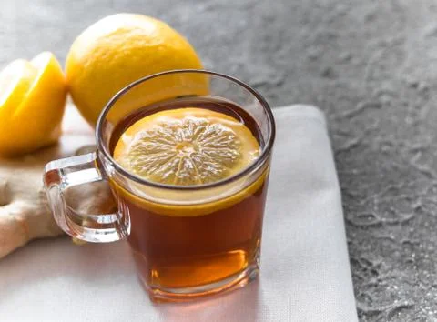 Tea with lemon and ginger root Stock Photos