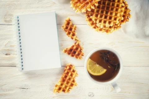 Tea with lemon and notepad Stock Photos