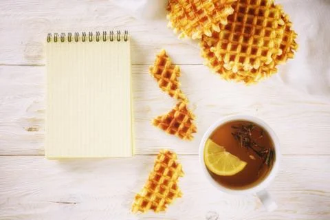 Tea with lemon and notepad Stock Photos