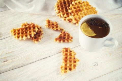 Tea with lemon and wafer Stock Photos