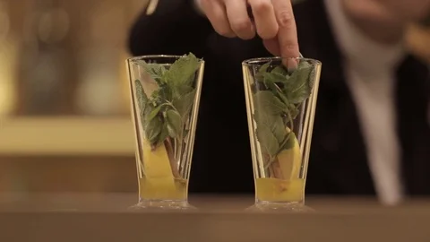Tea with lemon, ginger and mint in a beautiful glass cup. Stock Footage 82082577