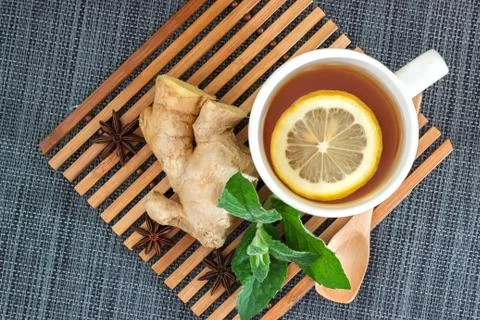 Tea with lemon leaves mint, root ginger and anise Stock Photos
