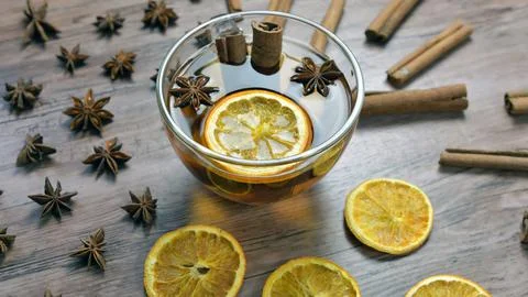 Tea with lemon slices and anise, cinnamon.Herbal tee Stock Photos
