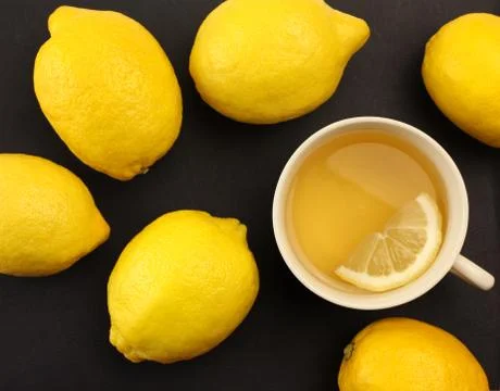 Tea with lemons Stock Photos