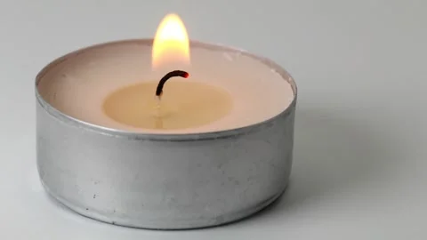 Tea light candle pan Stock Footage 289589103